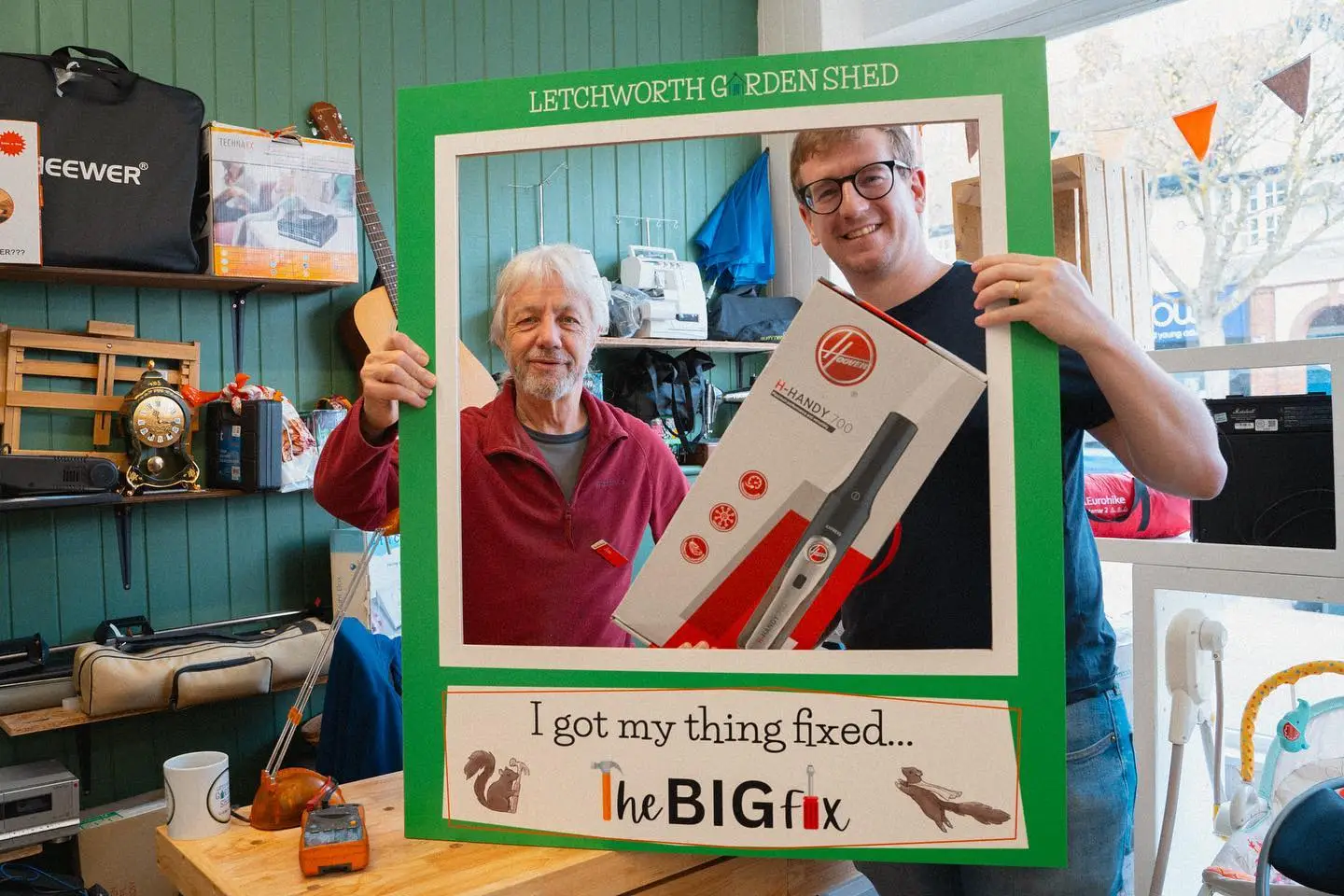 A happy visitor with their repaired item